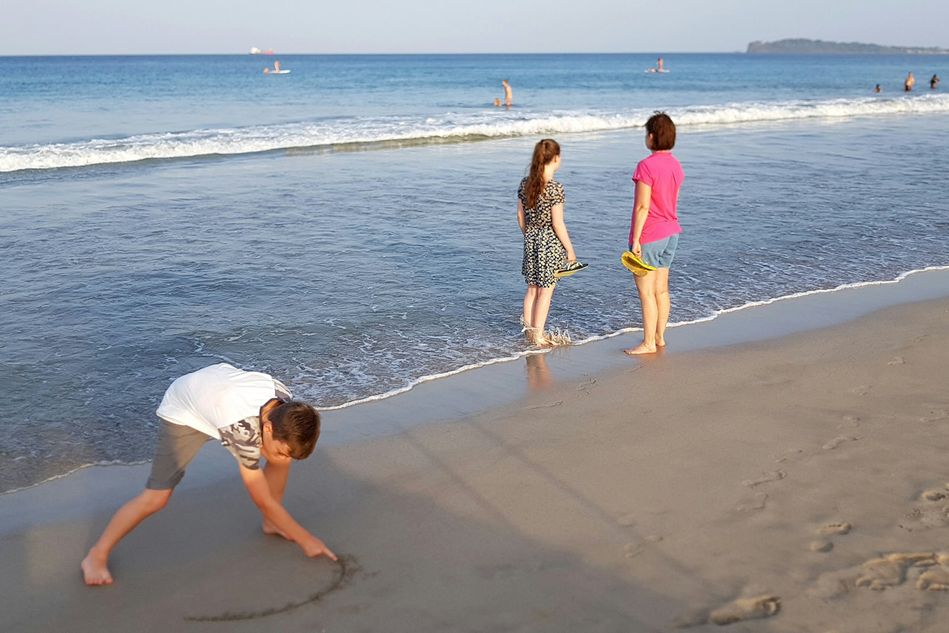  Family barefoot in the sand at Uppuveli