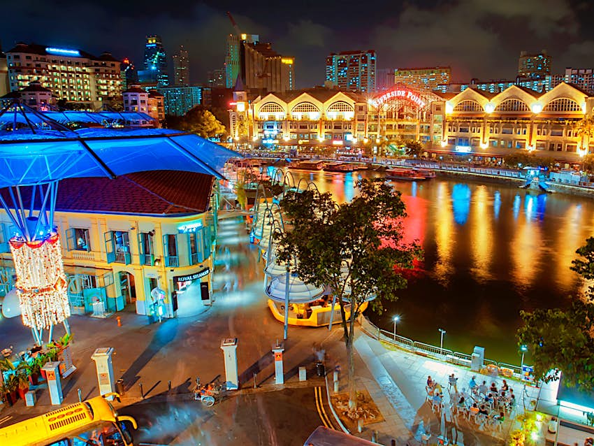 Riverside bars and restaurants at Clarke Quay are popular with tourists and locals alike