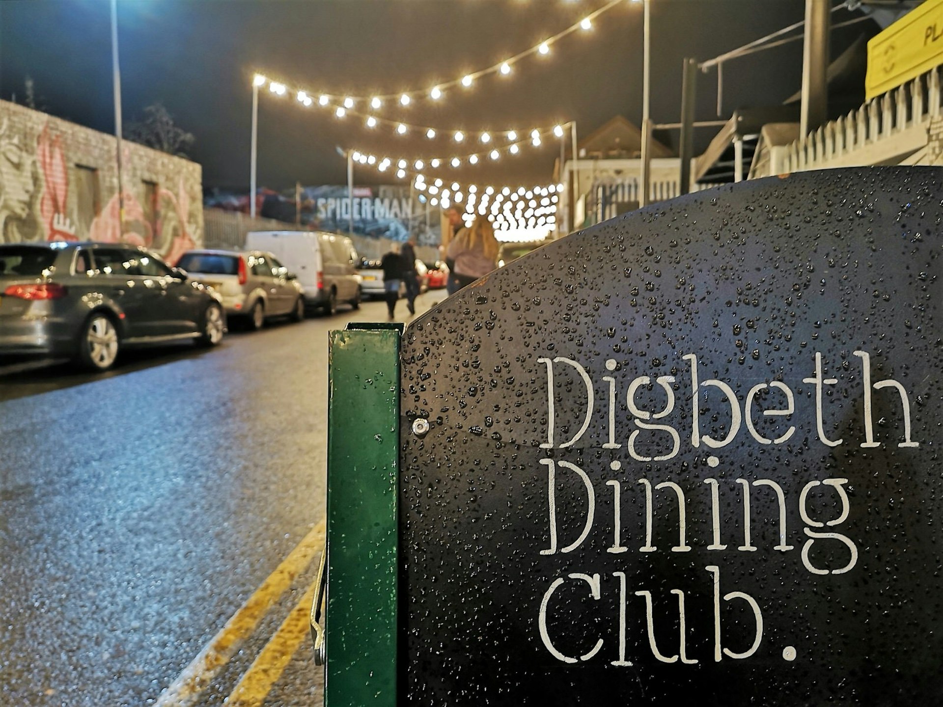 Roadside sign promoting Digbeth Dining Club's street food market.