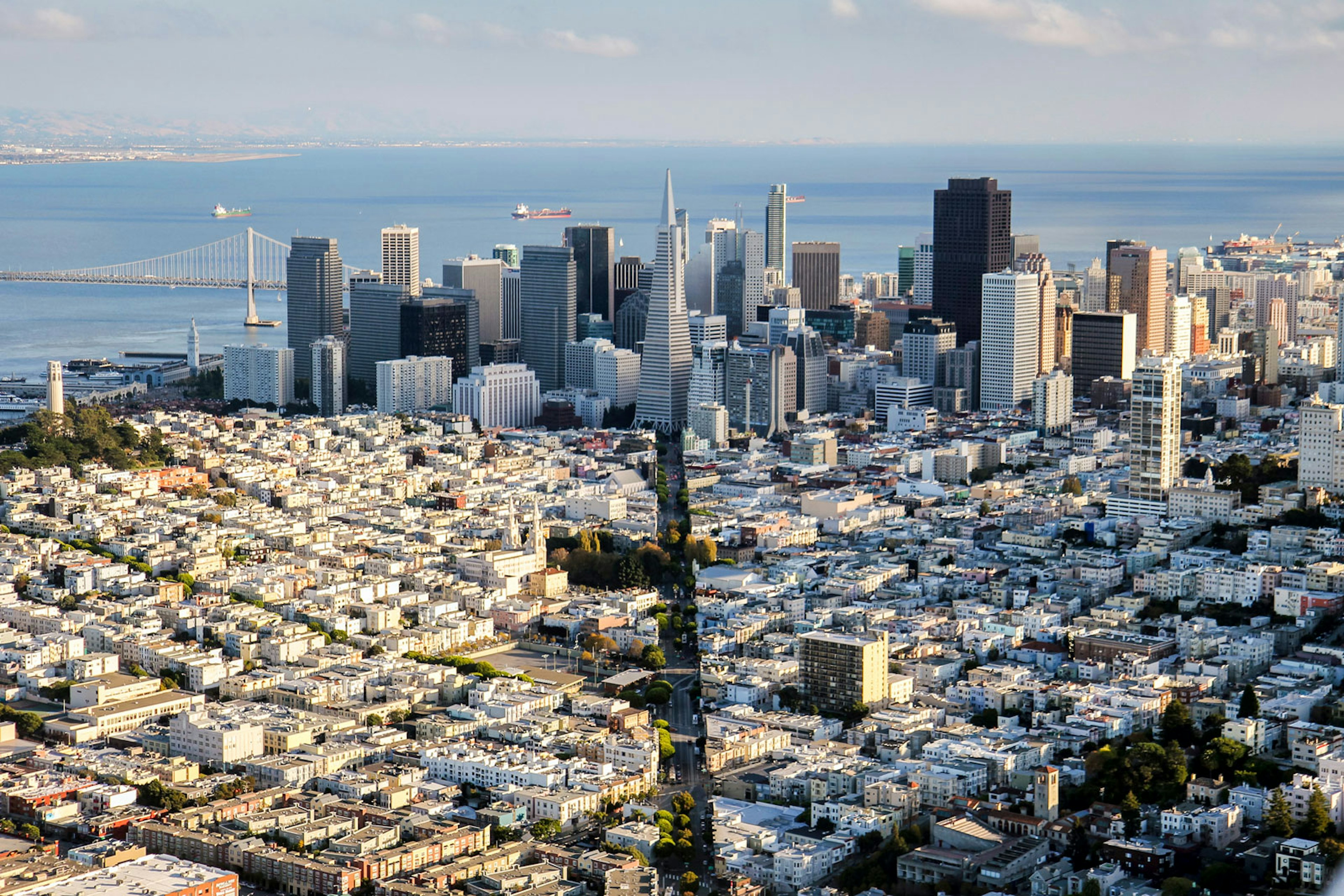 Aerial view of the San Francisco skyline with the bay in the background