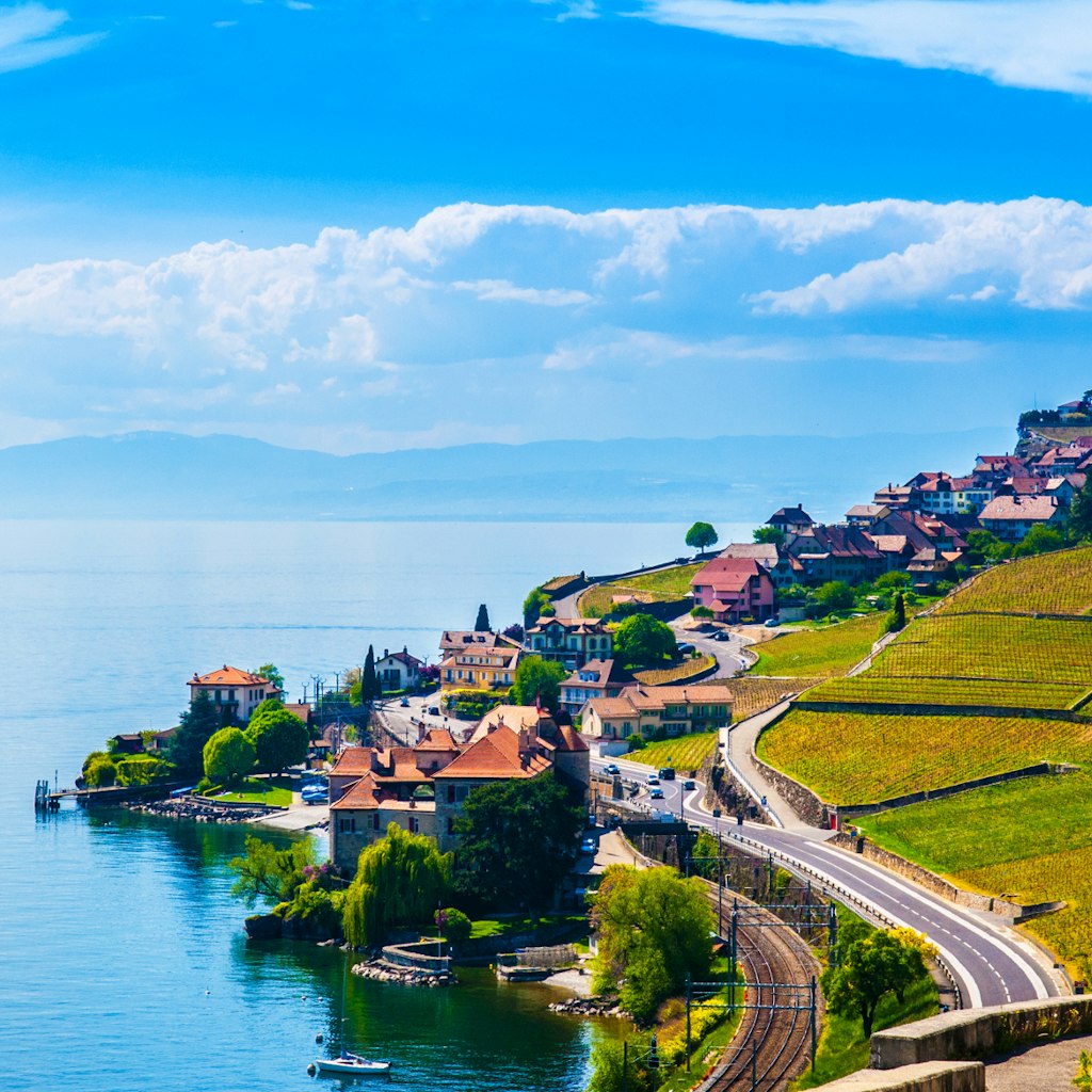 The World Heritage–listed vineyards of Lavaux set against Lake Geneva © PixHound / Shutterstock