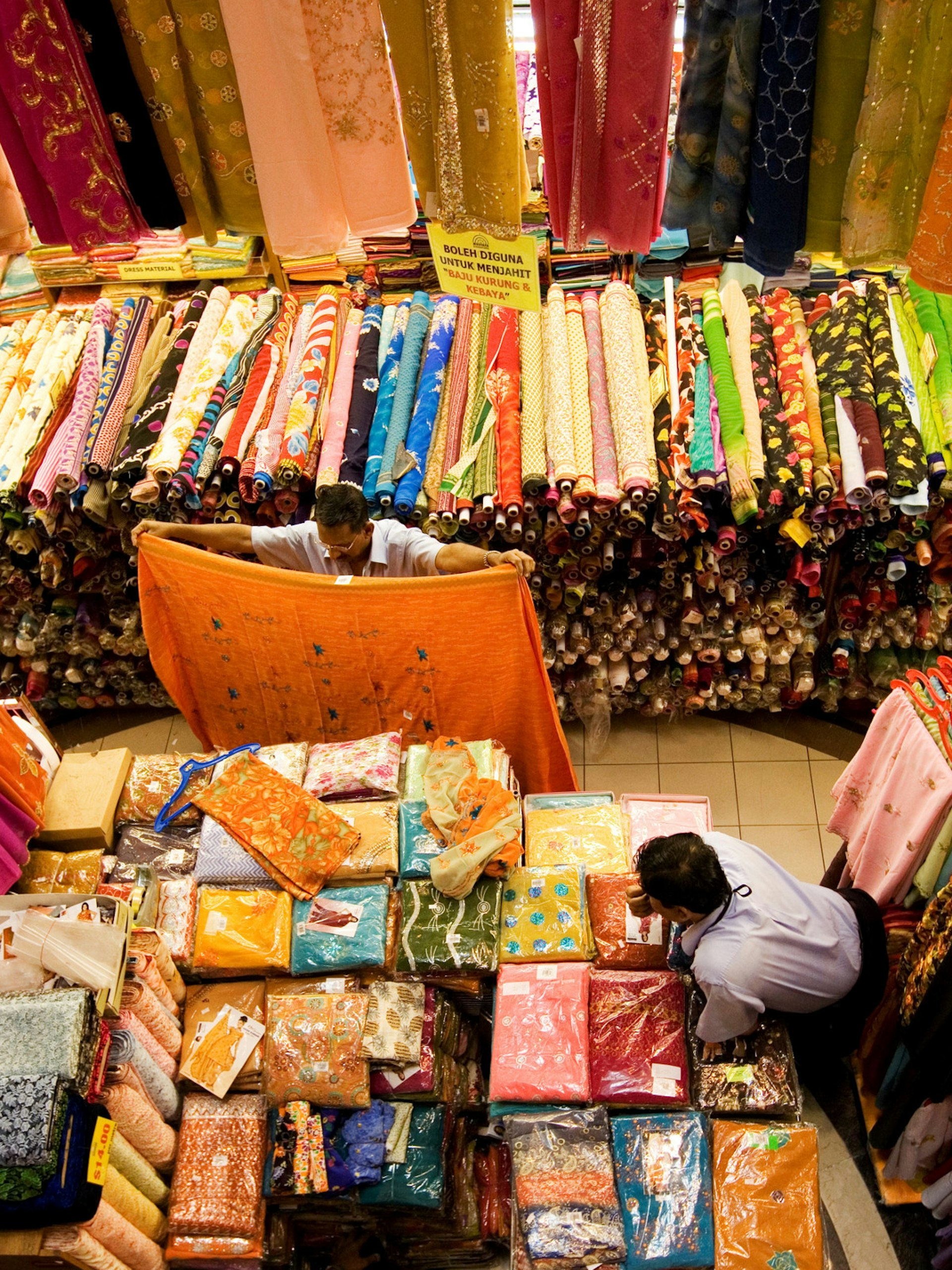 Colourful fabrics for sale at a stall in Little India’s Mustafa Centre