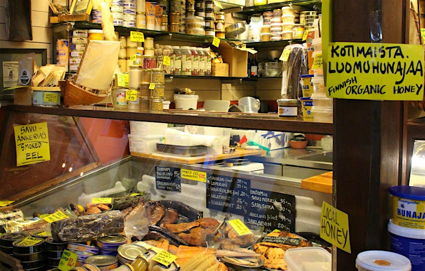 A display of local Finnish products such as honey and dried fish for sale at Kauppatori (Old Market Hall)