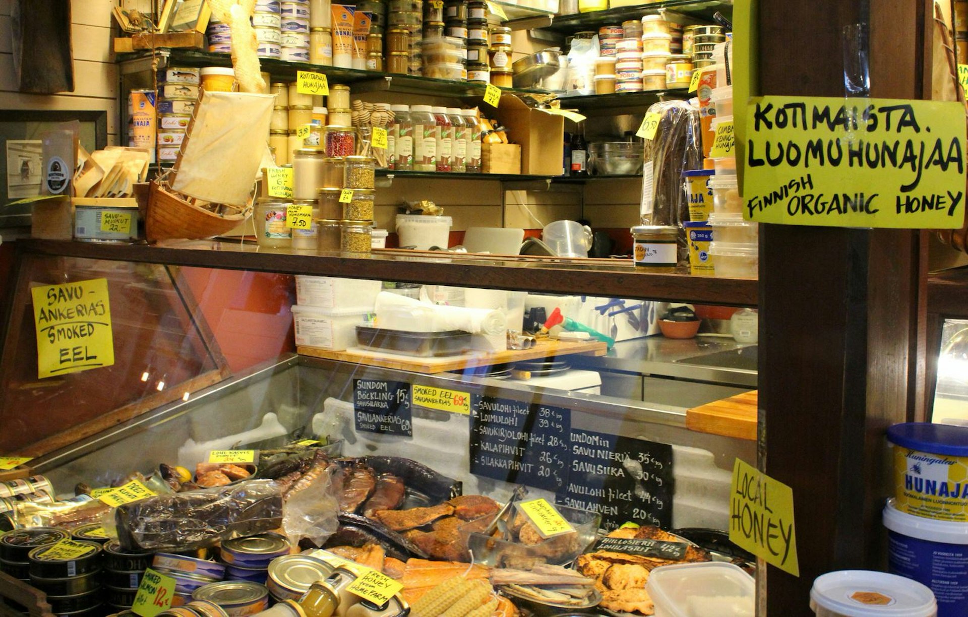 A display of local Finnish products such as honey and dried fish for sale at Kauppatori (Old Market Hall)