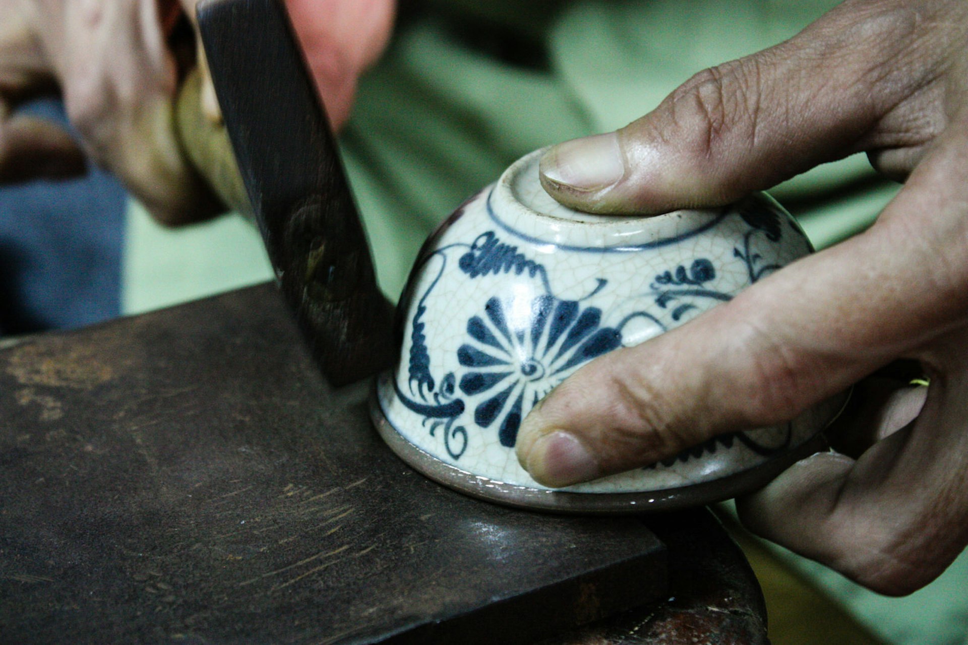 Decorative accents are added at Reaching Out, a workshop in Hoi An