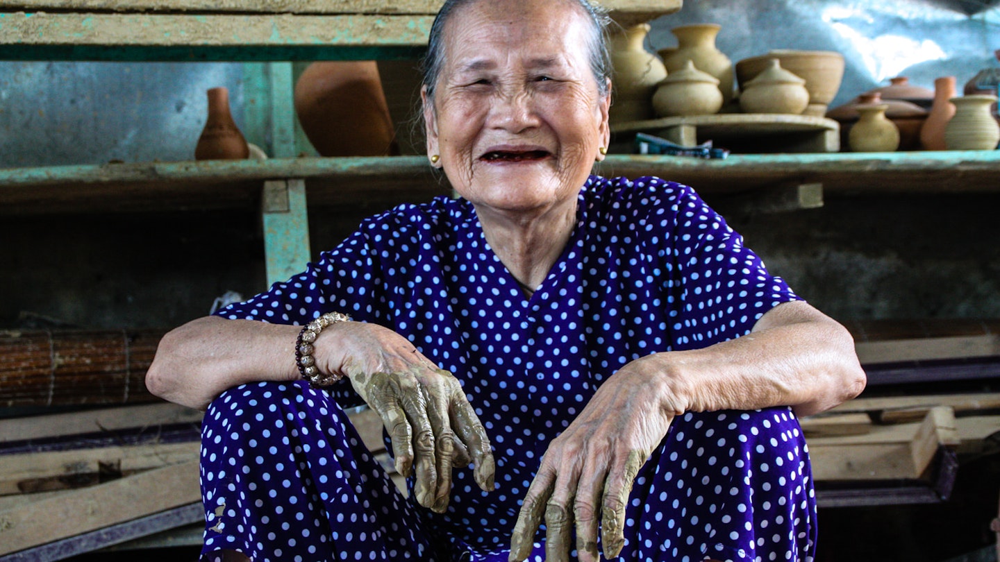 Portrait of Mrs Phu who still throws pottery in Thanh Ha Village, near Hoi An