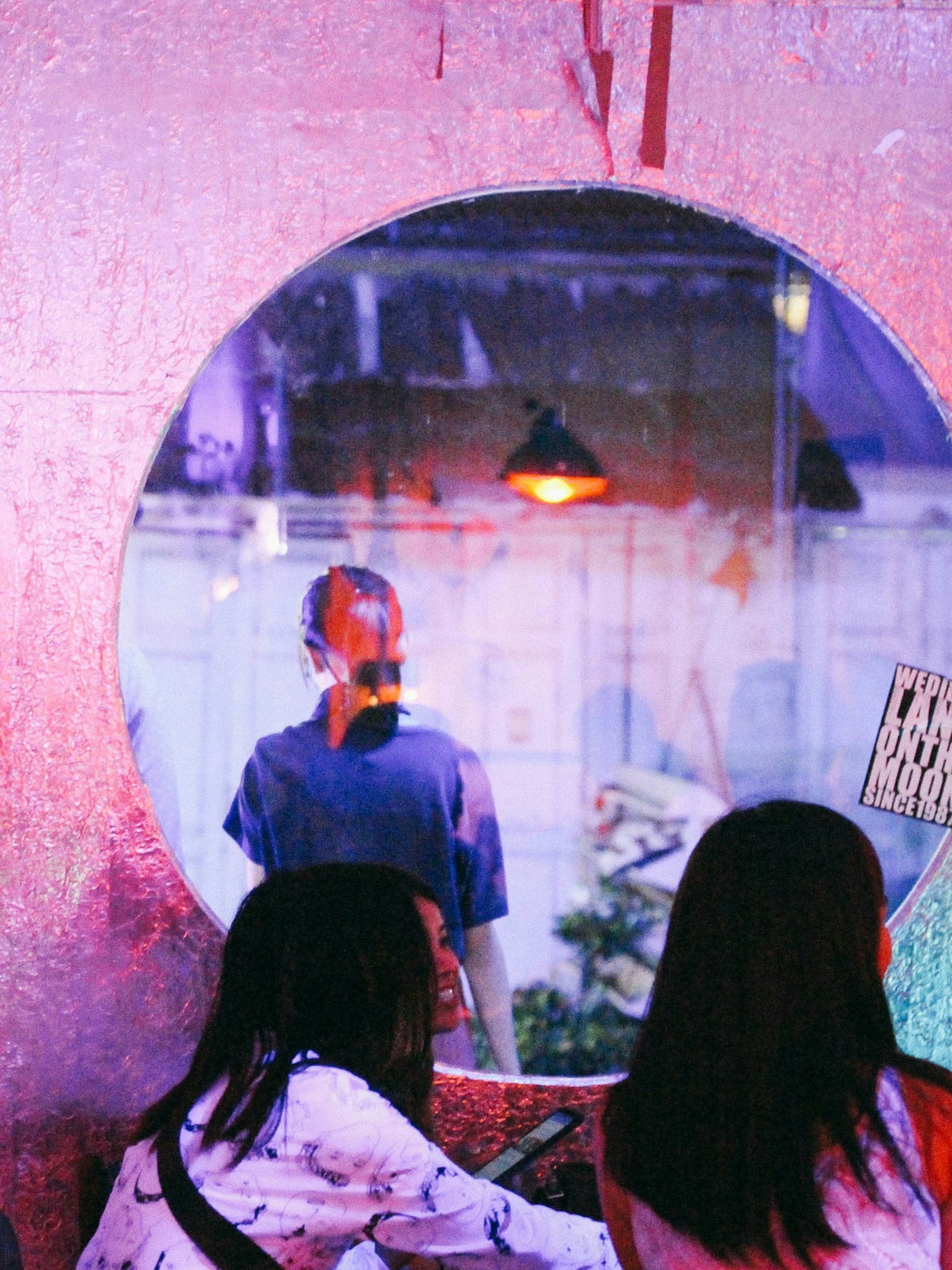 Locals enjoying a night out at We Didn't Land on the Moon Since 1987 bar in Chiang Mai