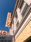 Upward-looking shot of the neon sign of the Apollo theater in Harlem