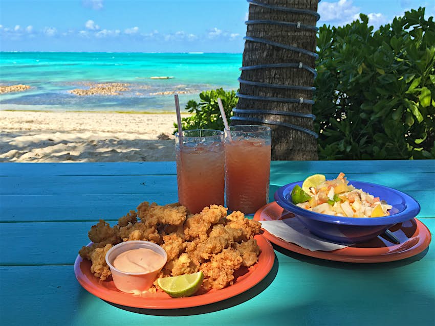 Conch fritters, similar to clams or scallops, are served year-round in the Cayman Islands © MevZup / Shutterstock