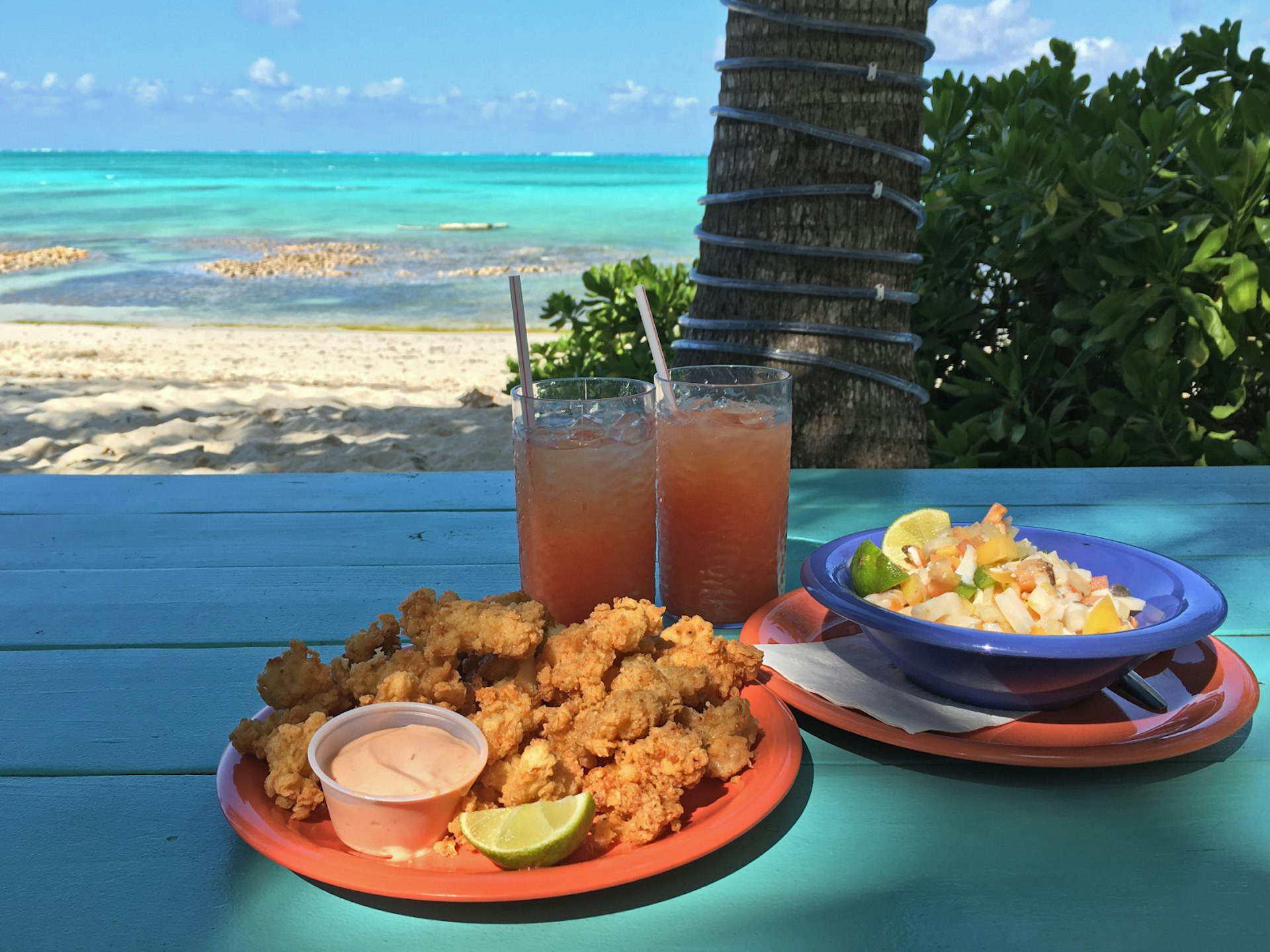 Conch fritters, similar to clams or scallops, are served year-round in the Cayman Islands © MevZup / Shutterstock