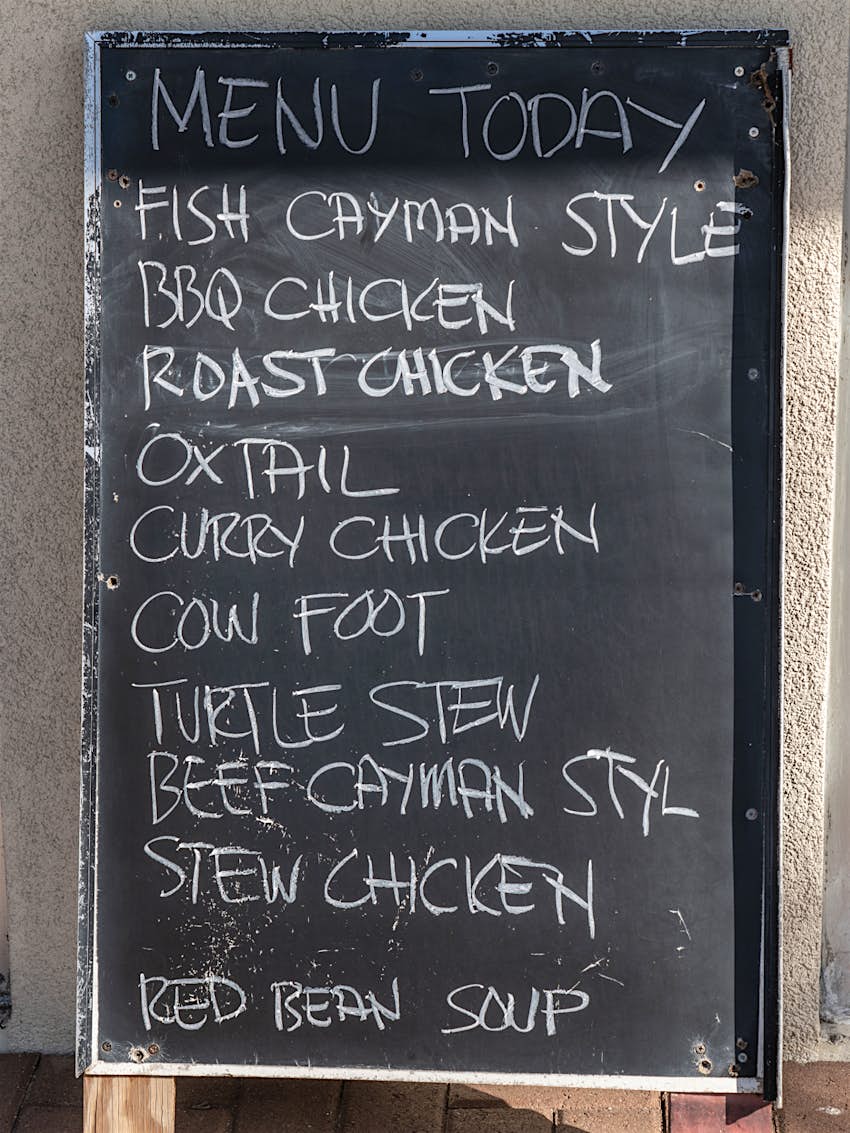 Cayman Islands lunch menu on chalkboard easel © Rosemarie Mosteller / Shutterstock