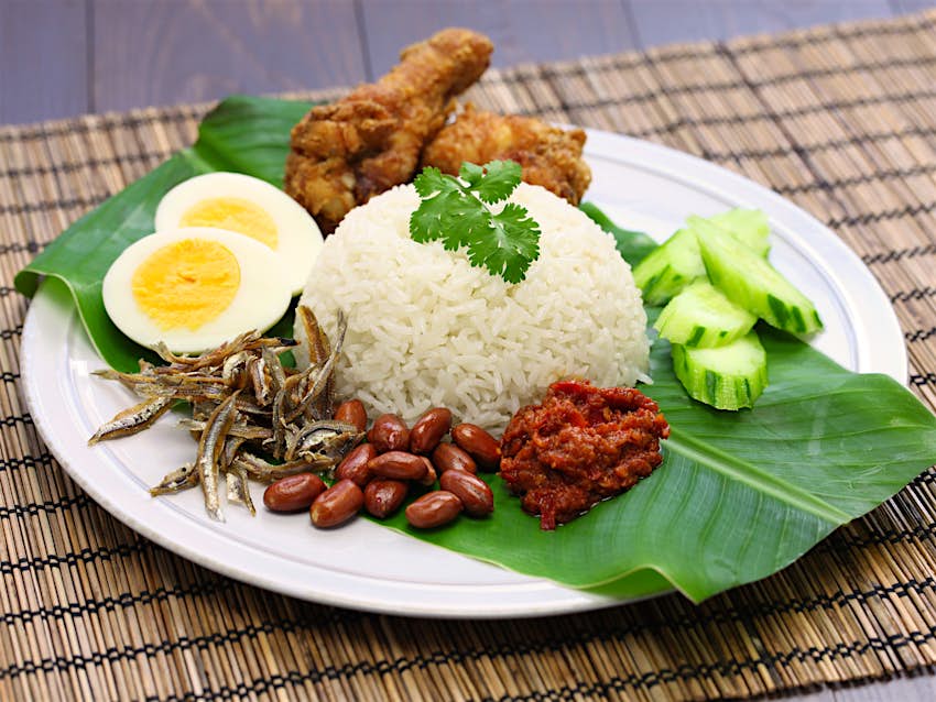A plate of nasi lemak with coconut milk rice 