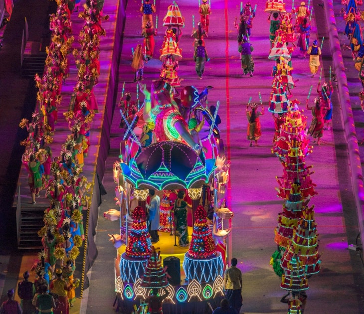 An large float covered in bright lights makes its way down the Chingay parade path.
