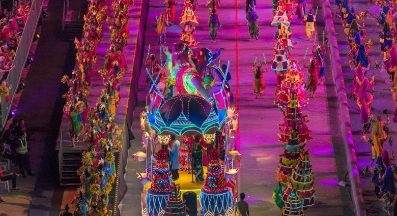 An large float covered in bright lights makes its way down the Chingay parade path.