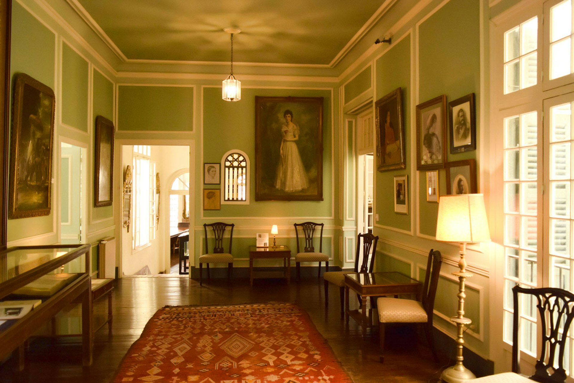 One of the inner rooms of the Tangier American Legation Museum is structured in a Victorian-era interior yet a traditional Moroccan rug remains.