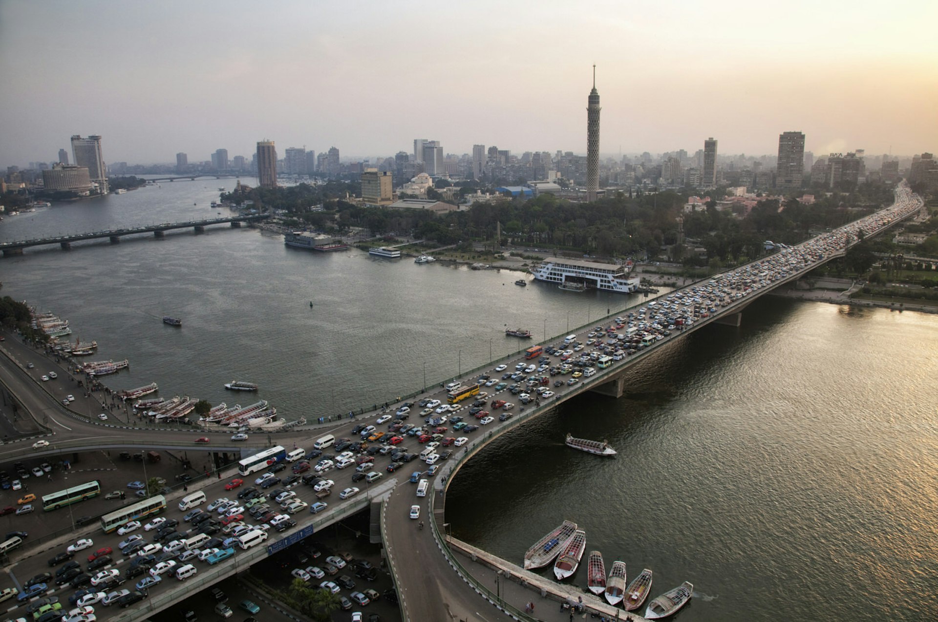 6th of October Bridge over the Nile, with traffic, at dusk, Cairo, Egypt