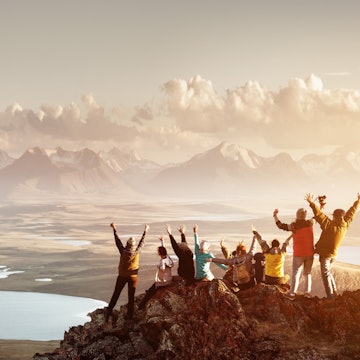 Features - Big group of people success mountain top