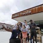 Group takes photo in front of modern-looking Hattiloo Theatre © Justin Fox Burks / Memphis Convention & Visitors Bureau