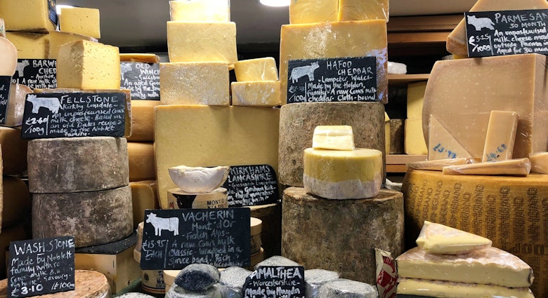 Cheese of all shapes and size on display in the Courtyard Dairy, North Yorkshire.