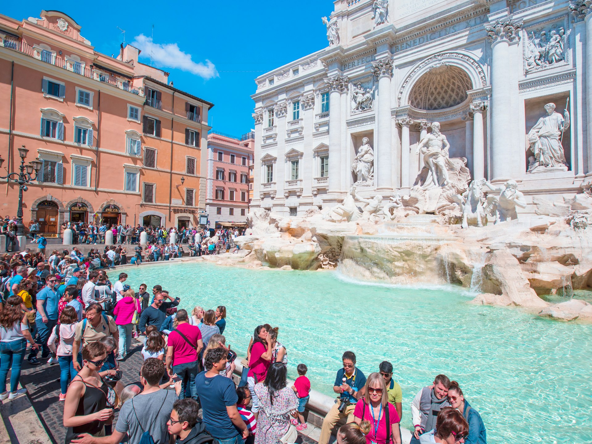 Crowds of tourists around the Trevi Fountain, Rome