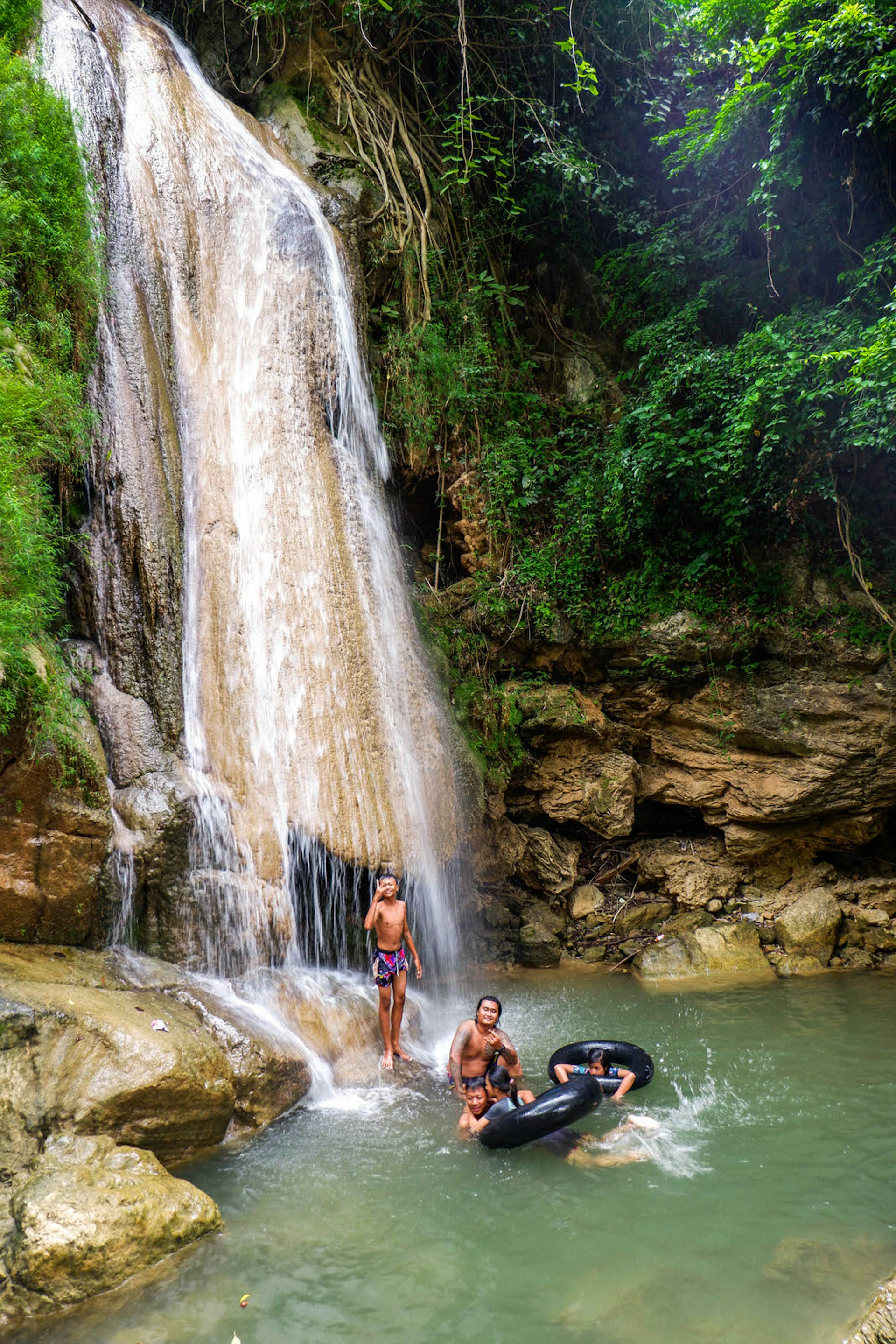 A group pose at the bottom of Whak Kar falls