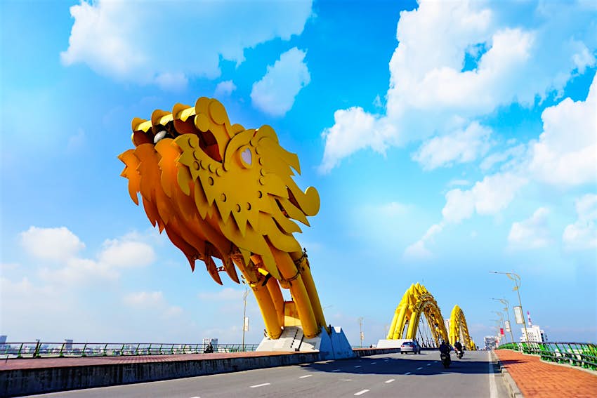 Features - dragon-bridge-danang-vietnam-5b6fee0d6cec Danang's Dragon Bridge on a cloudy day