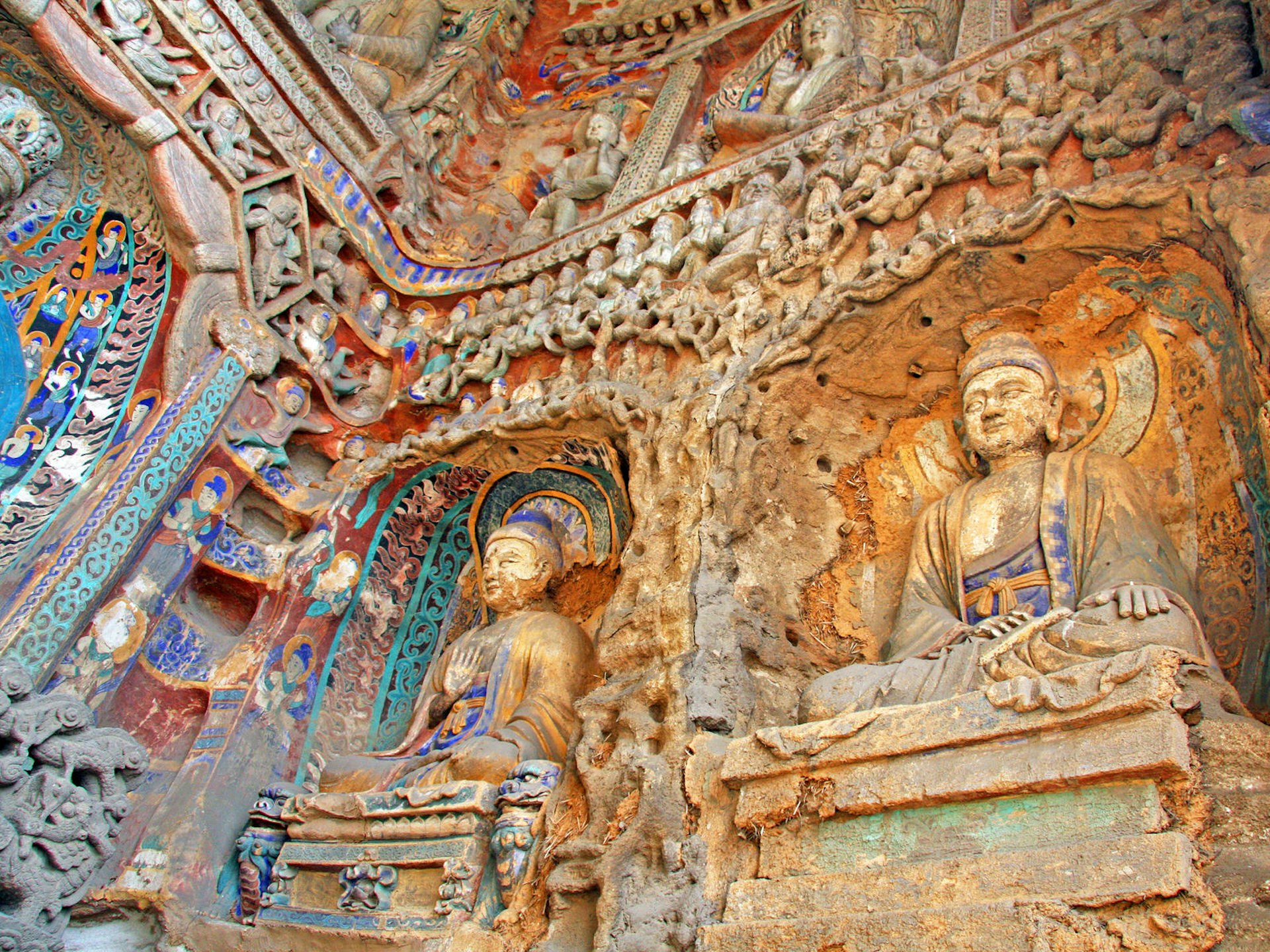 Colourful Buddhas and animal motifs adorn the grottoes at Yungang © Mark Brandon / Shutterstock