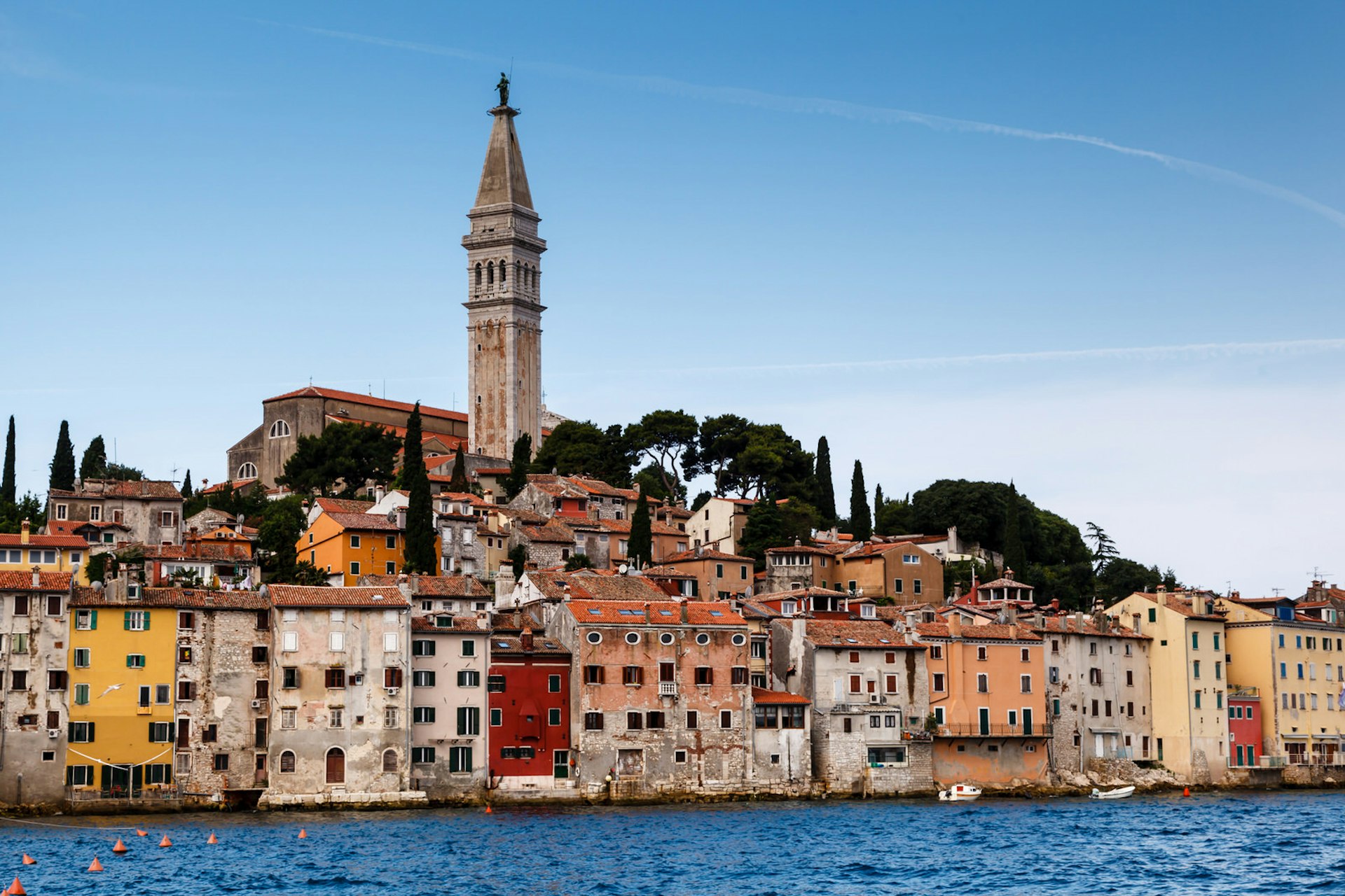 Rovinj's multicoloured buildings sit one above the other, with St Euphemia's Church at the top