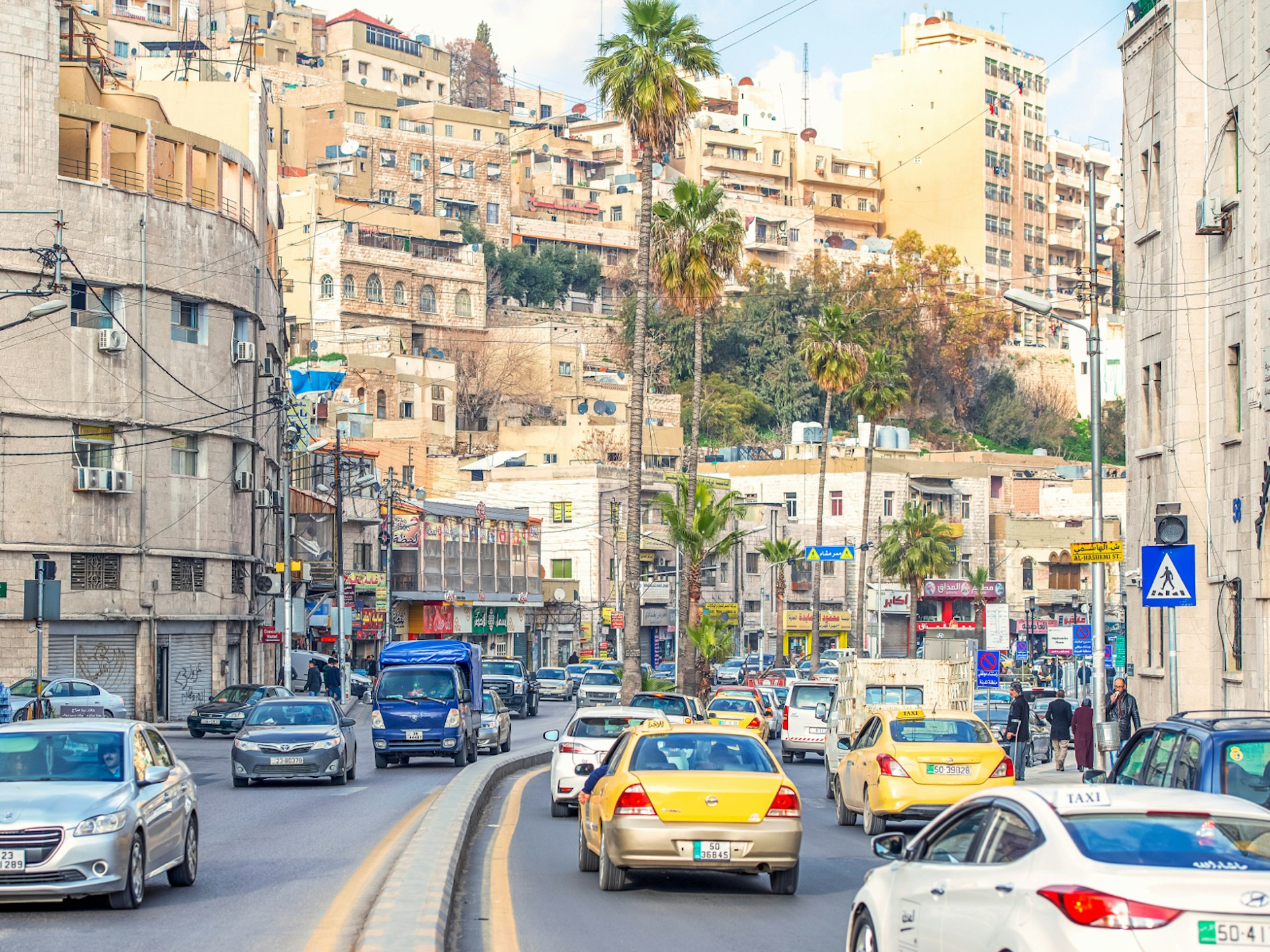 Traffic driving down a road in Amman