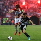 Red Star and Partizan players battle in a Serbian Super League match at Marakana stadium © Srdjan Stevanovic / Getty Images