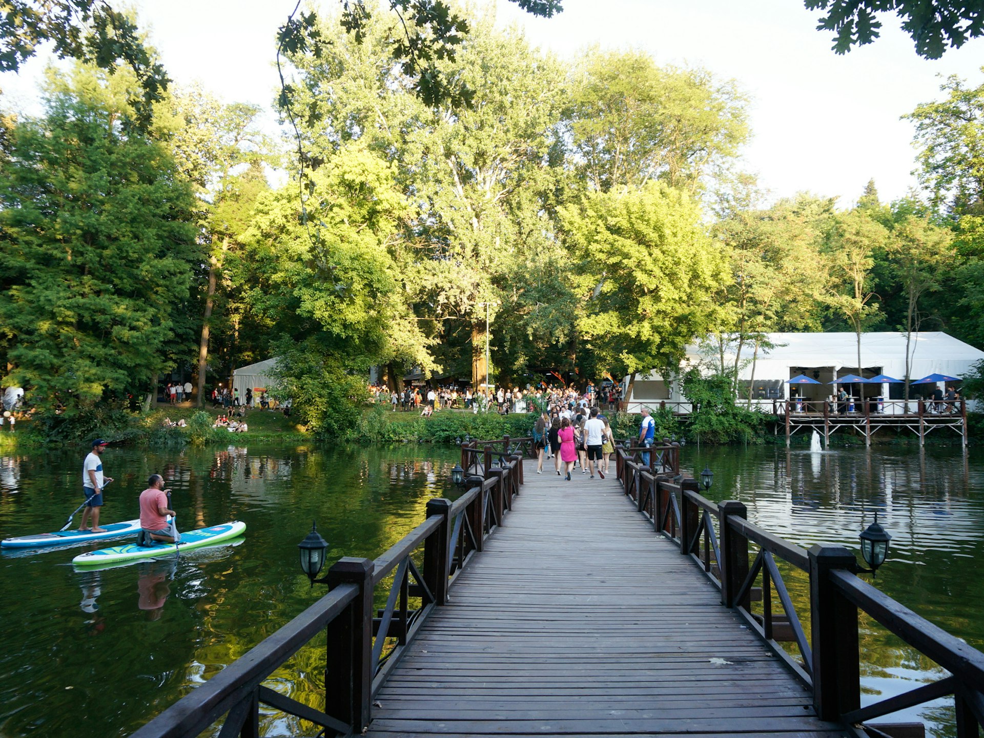 People enjoying a day out on Buftea Lake near Bucharest