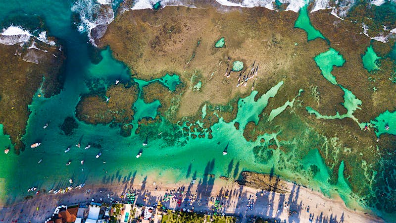 Features - Aerial view of the "Porto de Galinhas" beach An aerial view of the inlets off Porto de Galinhas beach, Brazil