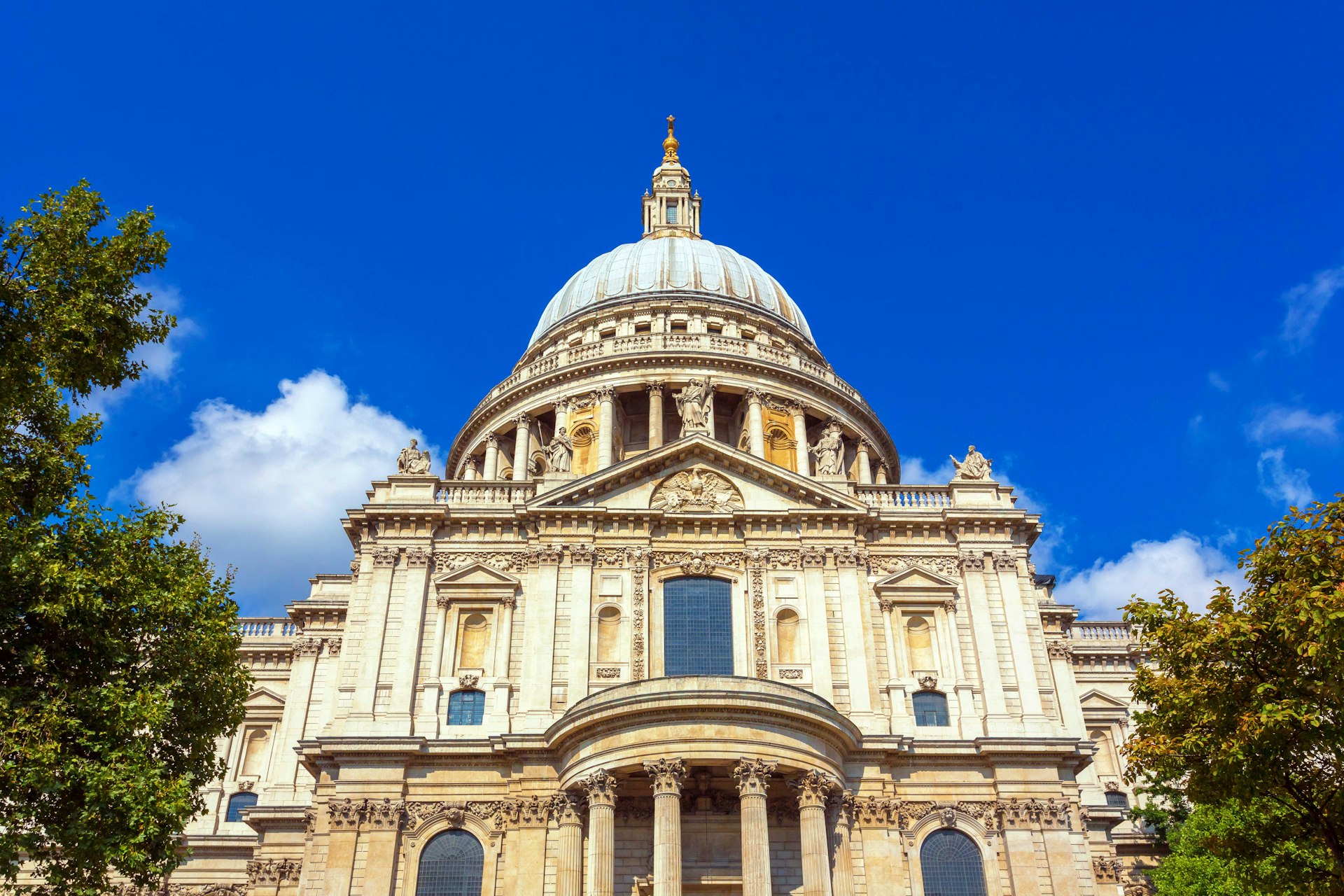 The dome of St Paul's Cathedral against a bright blue sky