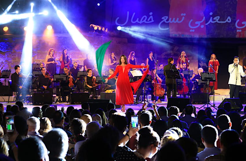 An orchestra performs with Tunisian pianist Mohamed Ali Kammoun at the International Festival of Carthage