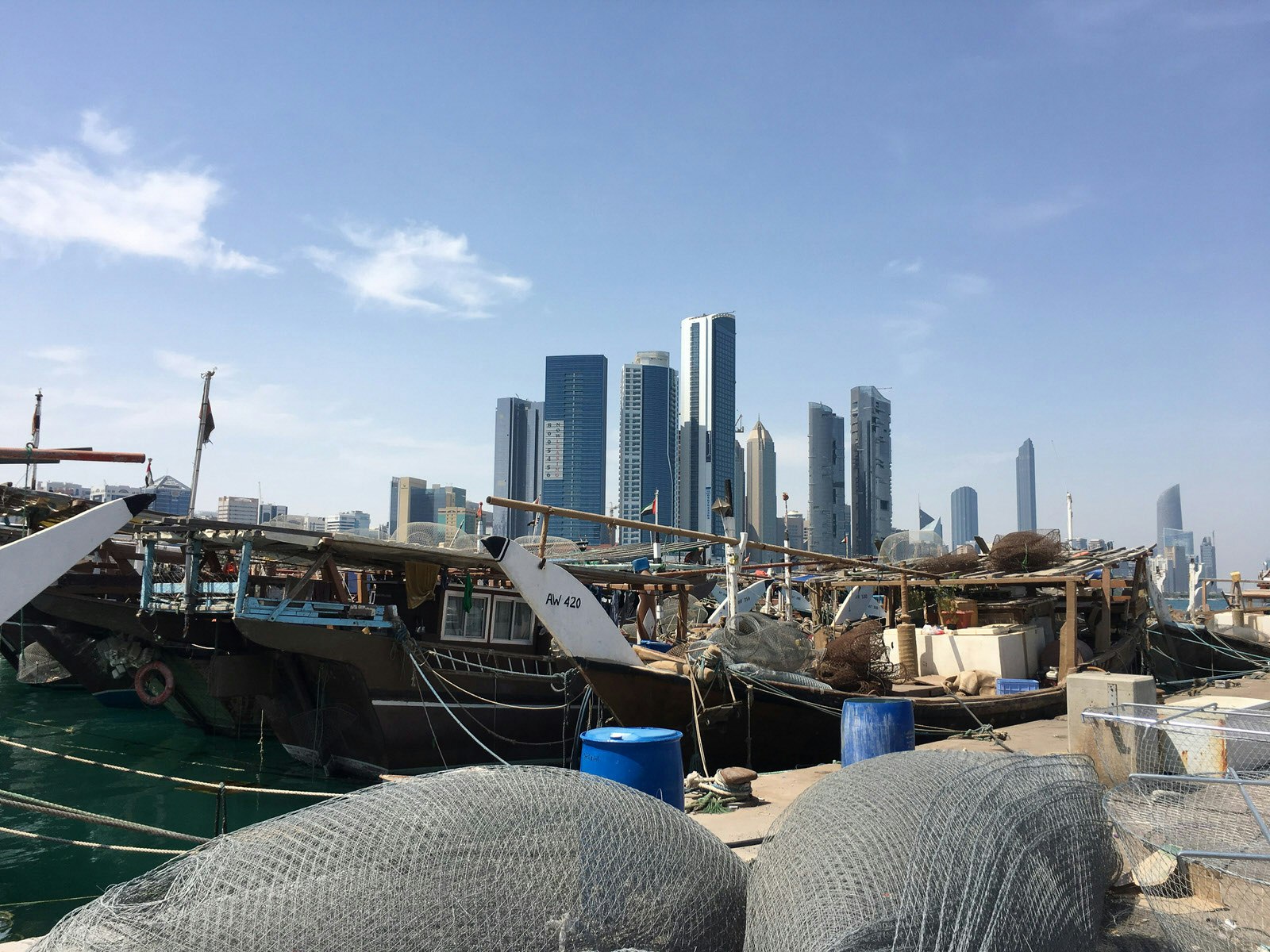 Lobster pots and docked dhows at the dhow harbour in Abu Dhabi, United Arab Emirates