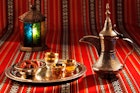 Features - Iconic Abrian fabric with Arabic tea and dates