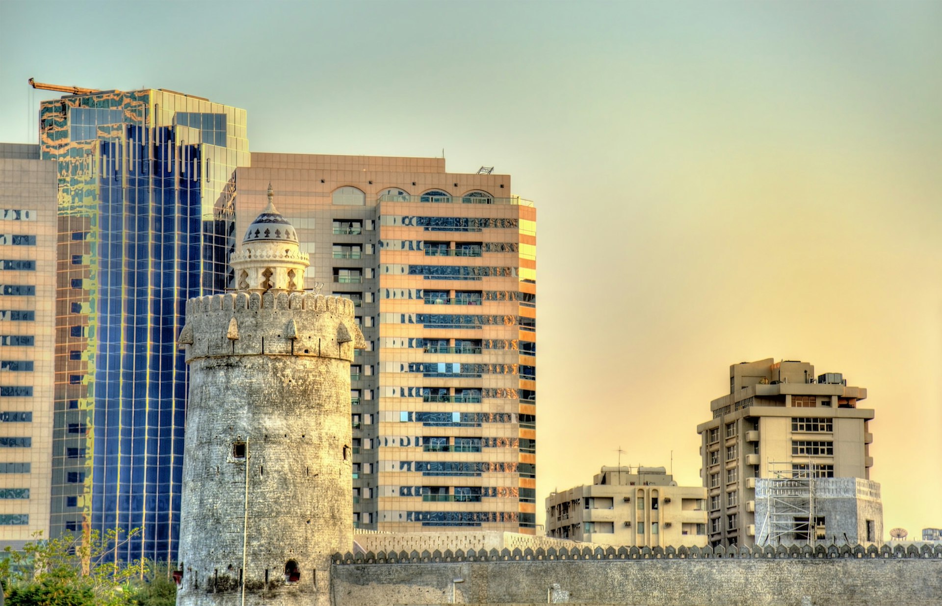 The fort of Qasr Al Hosn, the oldest building in Abu Dhabi, sits in front of modern skyscrapers