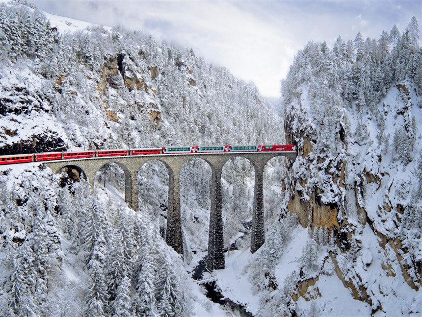 The Landwasser Viaduct with a Glacier Express train running over the top of it