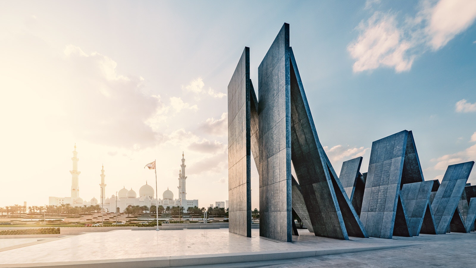 Panoramic image of Wahat Al Karama (Oasis of Dignity), a permanent memorial for the country's martyrs, with Sheikh Zayed Grand Mosque in the distance.