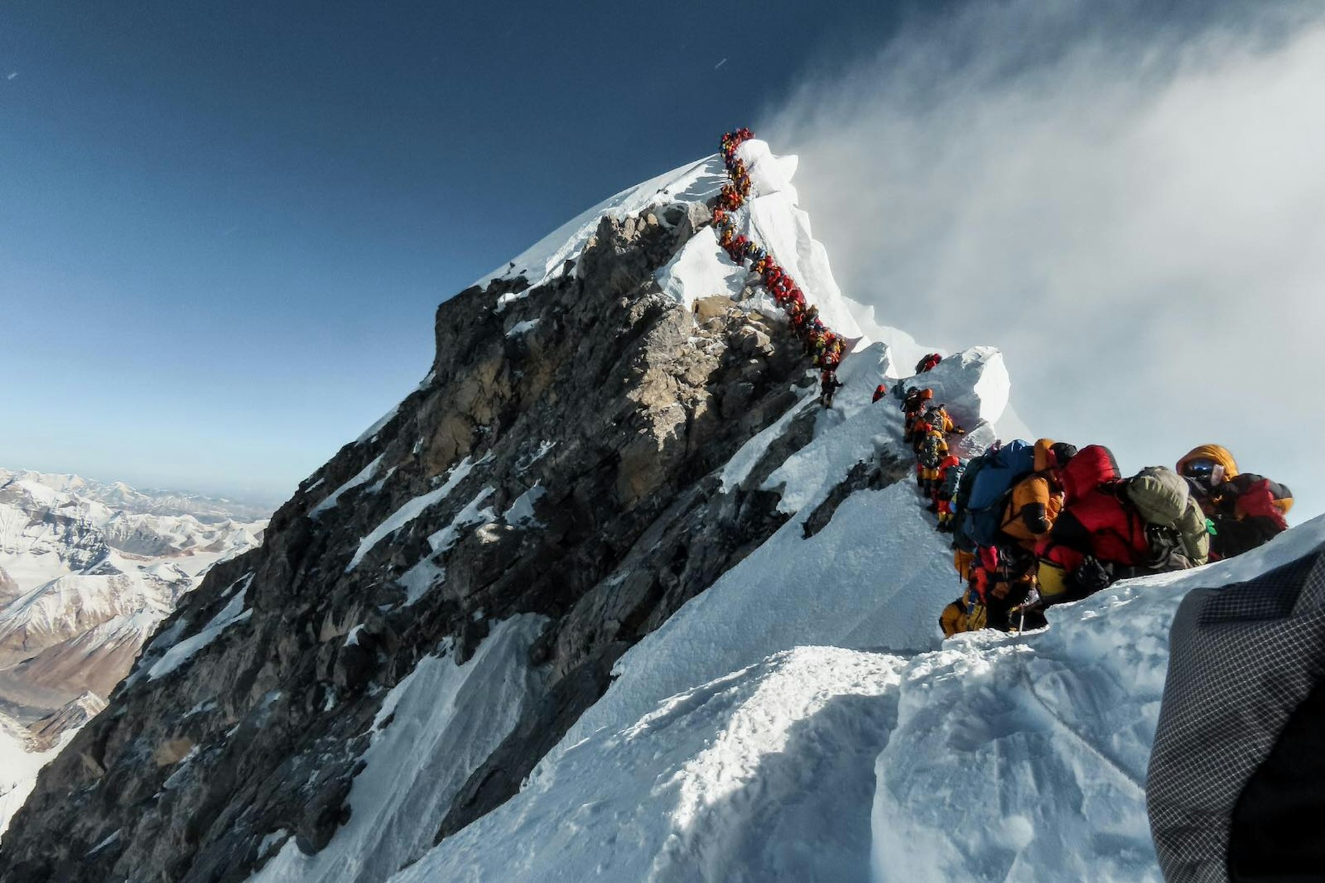 Queues of climbers on the final stages of the climb to the summit of Everest