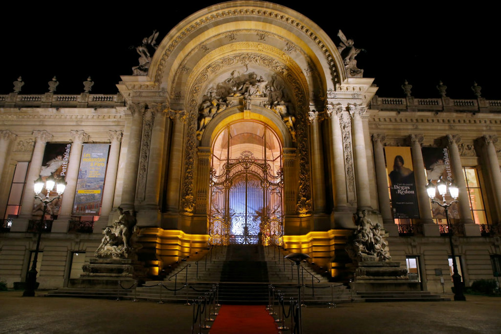 External night-time view of the Petit Palais bathed in lights