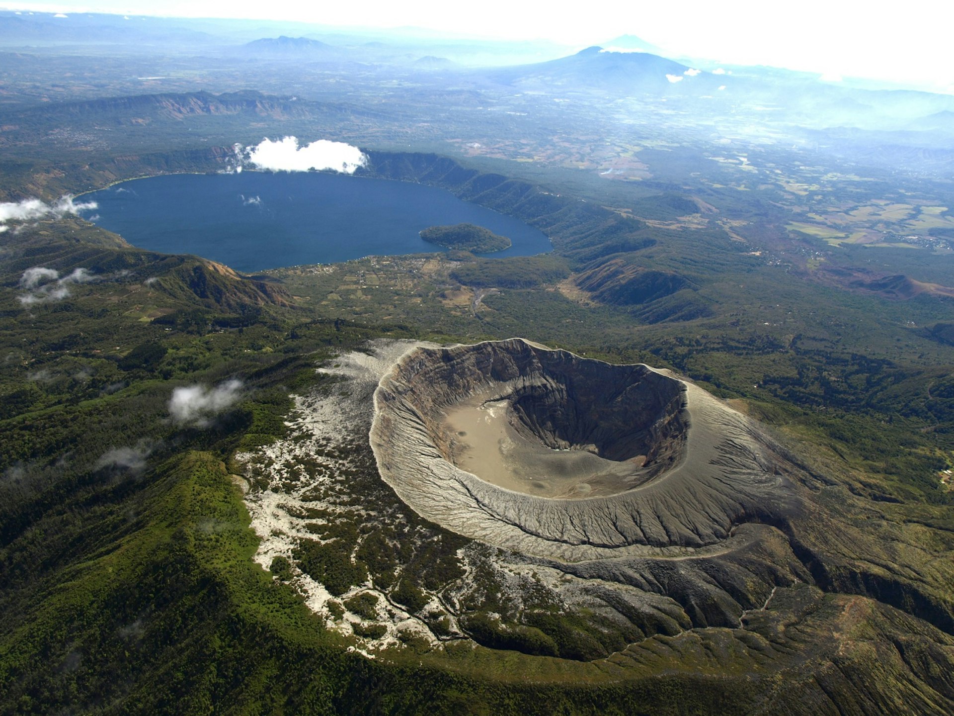 Aerial view of the Santa Ana Volcano crater and Lake Coatepeque in El Salvador