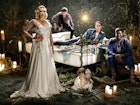 Celebrities West End Braodway - Gwendoline Christie leads the cast of A Midsummer Night's Dream at the Bridge Theatre, London. Gwendoline stands in front of the other cast members, posed around a wrought iron bed, in a floor-length, white silk gown © Perou