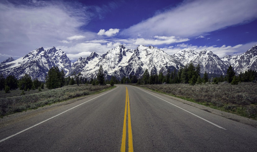 Features - Road into the Teton mountain range in the Morning