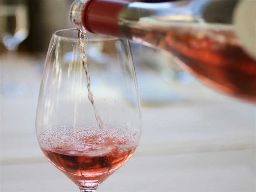 Pouring a glass of rosé wine