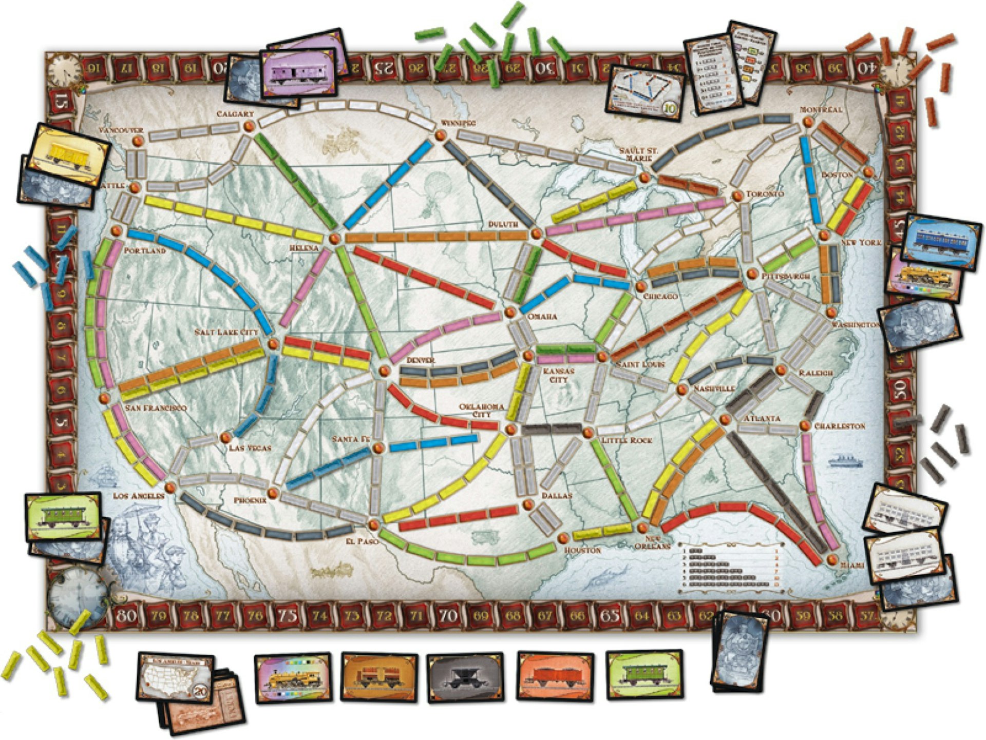 The board game Ticket to Ride is laid out on a white background