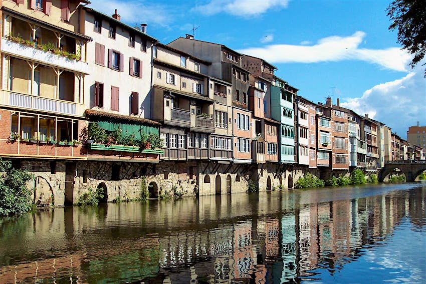 Tarn travel - Brightly painted tanneries lining the Agout river in Castres, in France's Tarn region