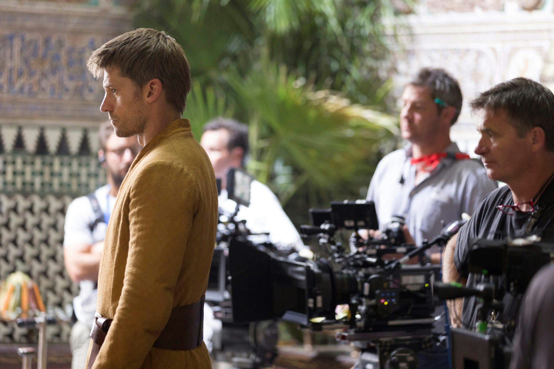 Actor Nikolaj Coster-Waldau stands in front of the camera on set in Seville