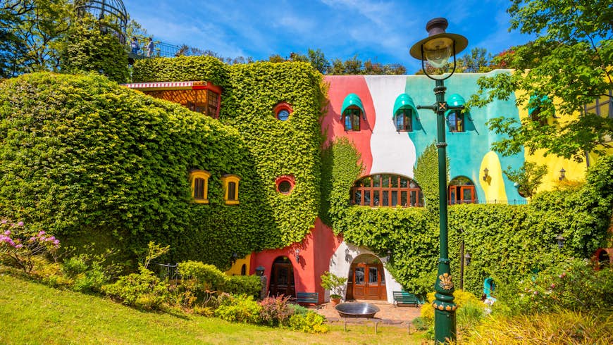 The foliage-clad, brightly coloured exterior of the Ghibli Museum in Tokyo