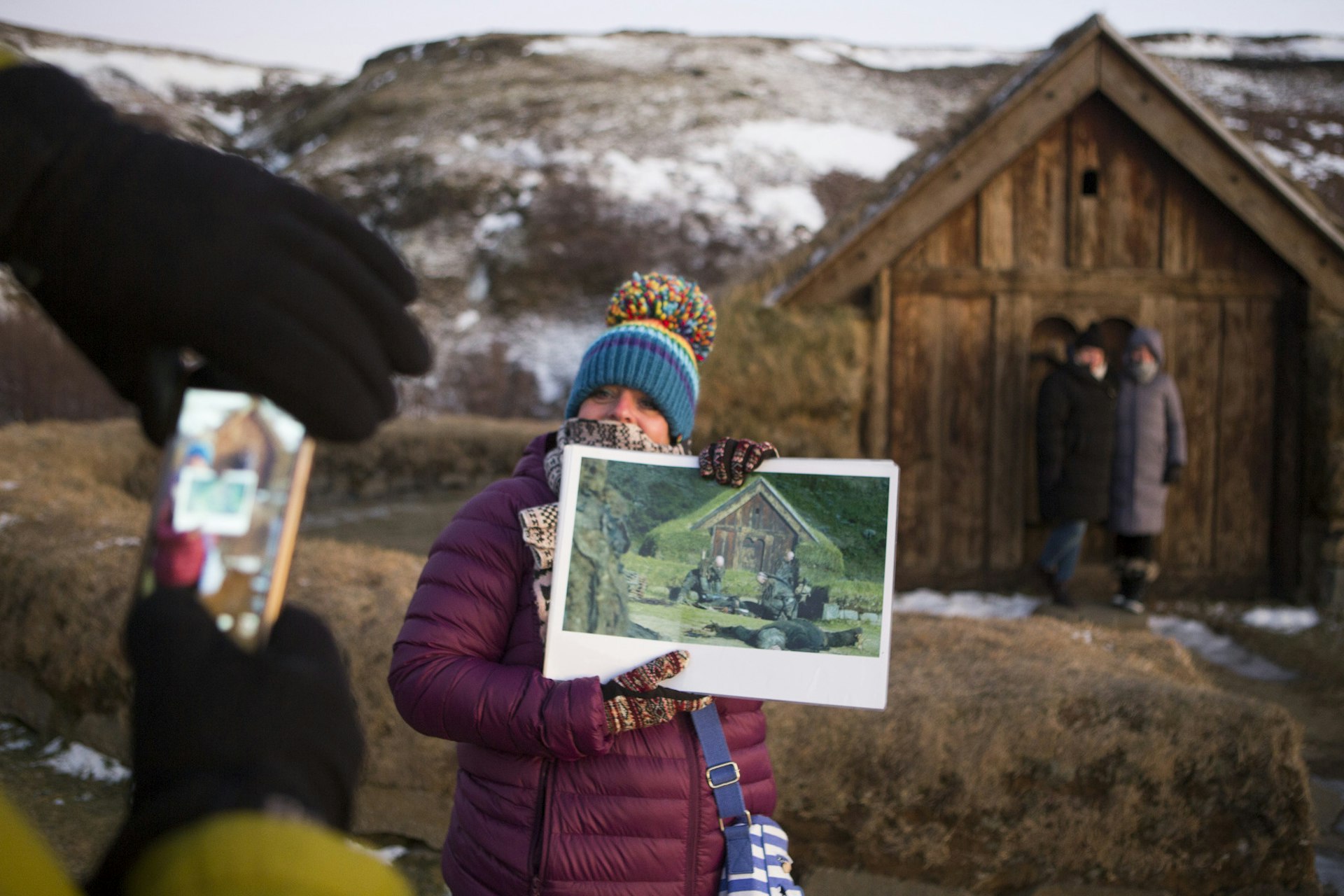 A visitor has their photo take in front of a Game of Thrones location in southern Iceland